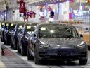 China-made Tesla Model 3 vehicles are seen during a delivery event at its factory in Shanghai, China January 7, 2020.