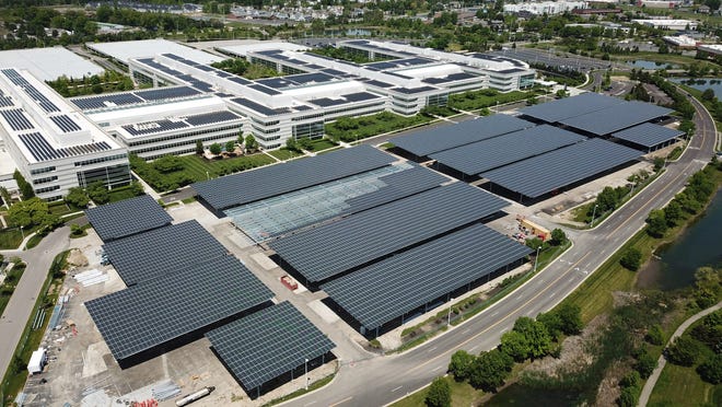 Work is almost complete on the JPMorgan Chase McCoy Center project covering the massive parking lot with solar panels while also creating covered parking for workers.