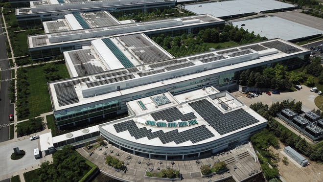 The JPMorgan Chase McCoy Center has had solar panels on the roof for several years. They are now covering the massive parking lot with solar panels while also creating covered parking for workers.