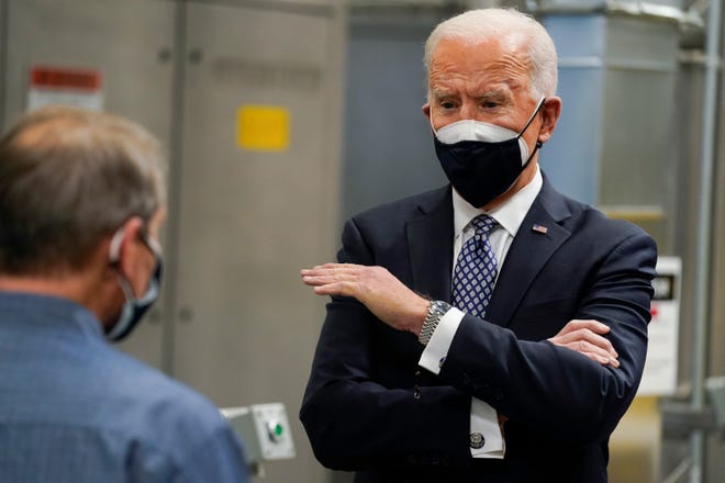President Joe Biden tours a Pfizer manufacturing site, Friday in Portage.