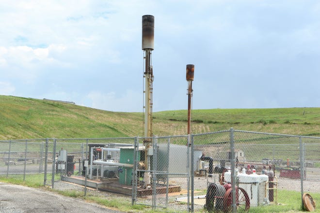 Natural gas collectors at the New Castle landfill in Delaware dispersing collected underground gasses safely into the air.