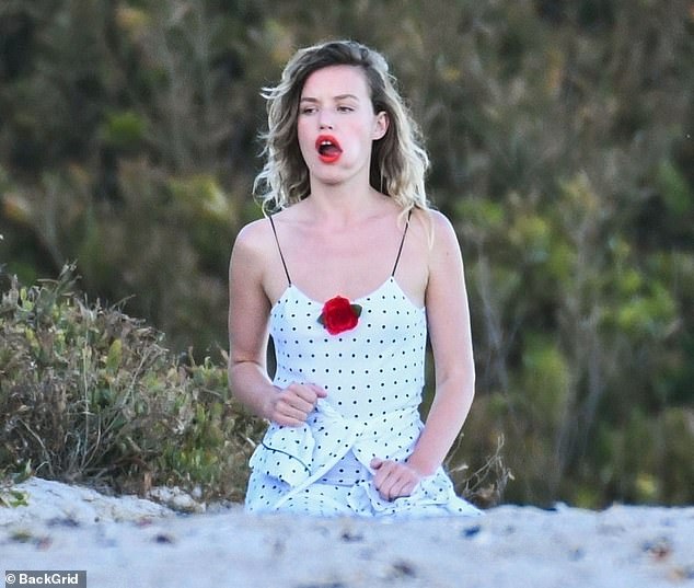 Georgia May Jagger looked every inch an English rose as she showed off her father's famous pout during a Malibu photoshoot