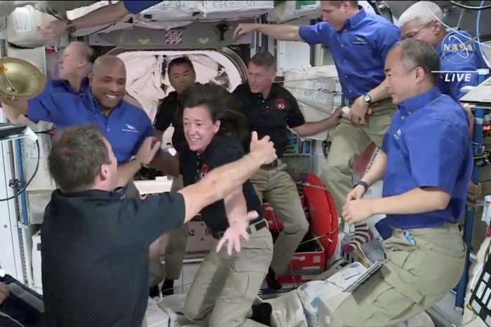 European Space Agency astronaut Thomas Pesquet celebrates with Nasa astronaut Megan McArthur as they and Crew 2 colleagues Jaxa astronaut Akihiko Hoshide of Japan and Nasa’s Shane Kimbrough are welcomed by Crew 1 after arriving aboard the International Space Station in April 2021